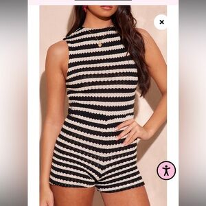 Black and cream/white striped romper from Pretty little thing